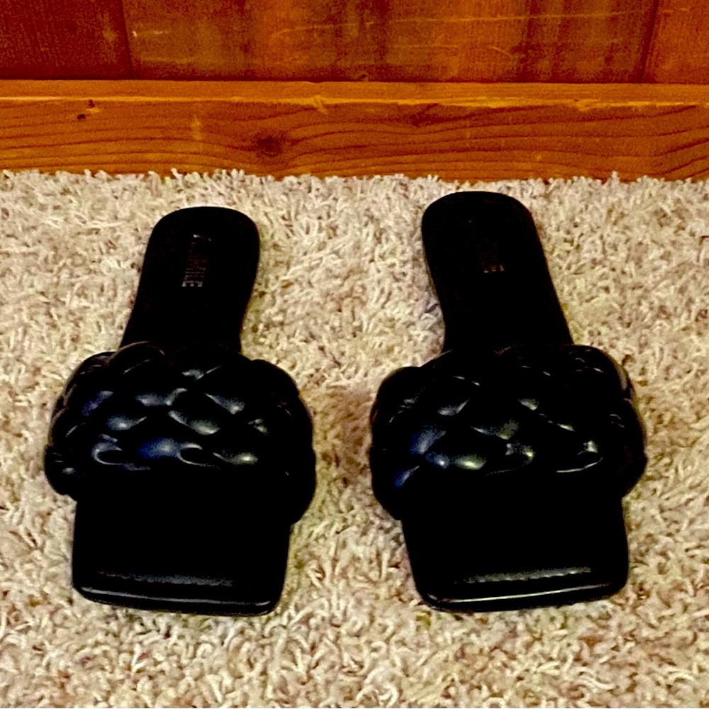 Black braided flats. Size 7.5